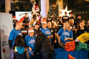 Volunteers receiving gifts at the 31st Annual Pan Pacific Christmas Wish Breakfast on December 13, 2018.